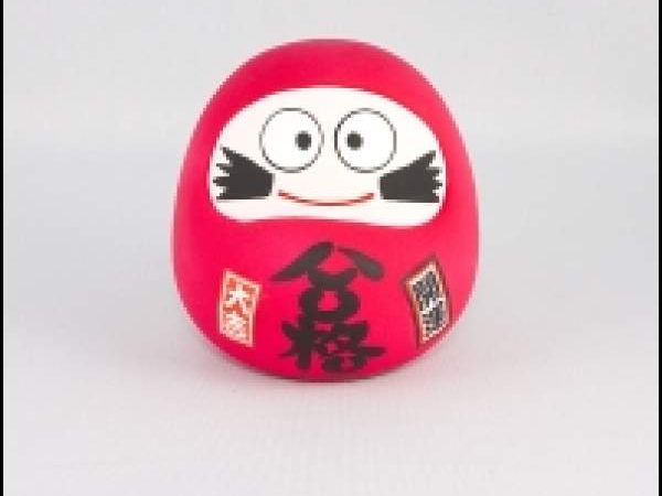 Daruma sympa en céramique , son rôle est de vous protéger ;)